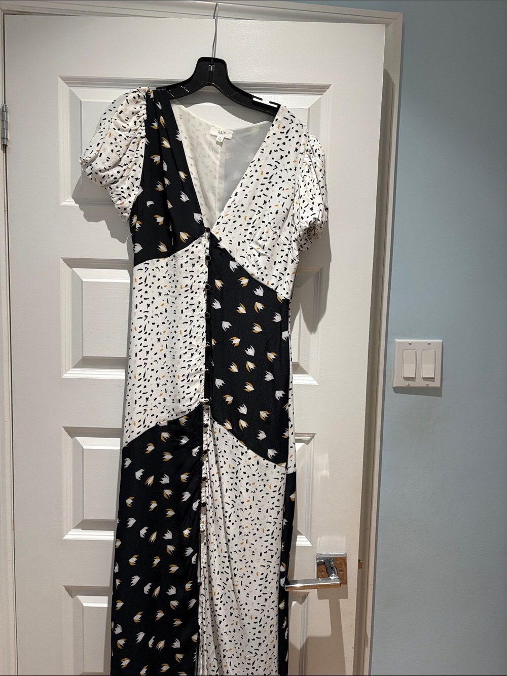 Black and White Colorblock Maxi Dress with Gold Accent